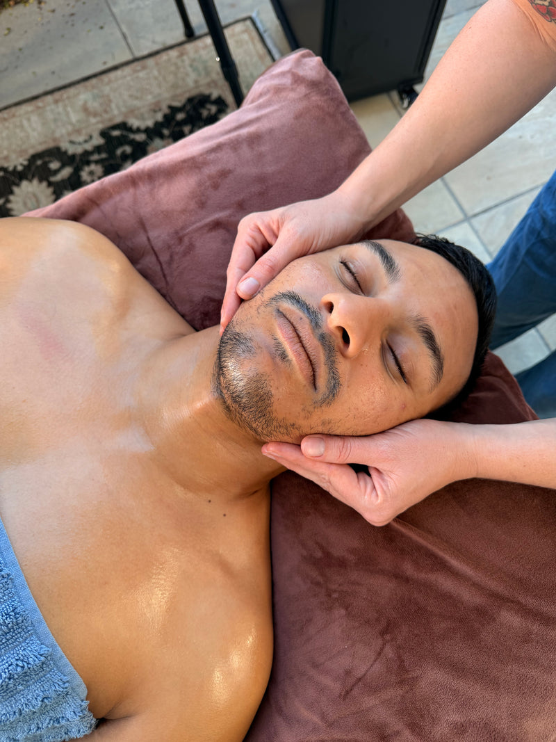 Professional facial massage treatment promoting relaxation wellness and stress relief