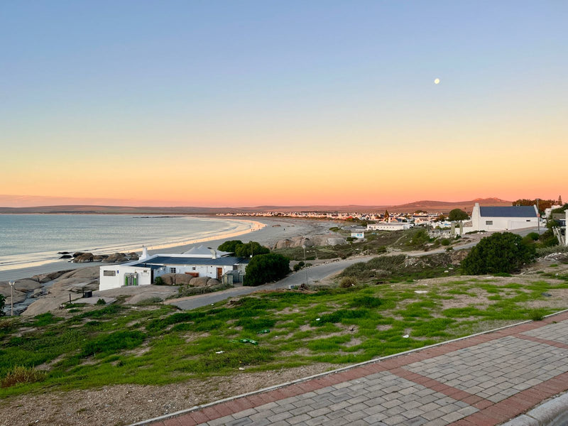 Panoramic Paternoster beachfront view during sunset with coastal homes and ocean scenery